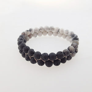 Gemstone bracelet by Pellara, Yin & Yang, made of Lava rock, Map Jasper, Black Silk Stone, Rutilated Quartz & Howlite.