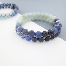 Load image into Gallery viewer, Gemstone bracelet by Pellara, inspired by Blue Jay, made of Amazonite, Sodalite, Blue Tiger. Third eye, Throat and Heart chakra