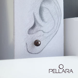 Sterling silver natural gemstone stud earrings contains a sparkling piece of Cubic Zirconia. Very light and hypo-allergenic, 6mm or 8mm beads. Bronzite