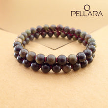 Load image into Gallery viewer, Chakra gemstone bracelet for The Base (Root) Chakra designed by Pellara. Made in Canada. Contains Black Tourmaline, Black Obsidian and Dragon Blood Stone crystals.