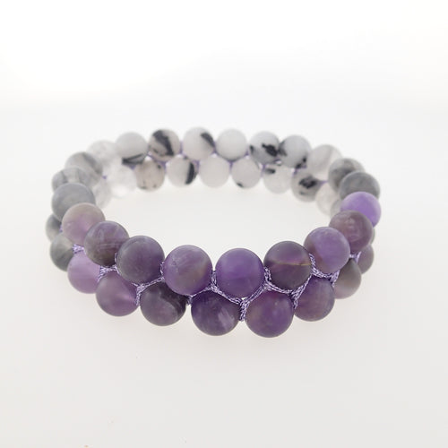 Gemstone bracelet by Pellara, inspired by bell flower, made of White rutilated quartz & Amethyst. Pisces & Leo zodiacs. 8mm