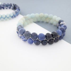 Gemstone bracelet by Pellara, inspired by Blue Jay, made of Amazonite, Sodalite, Blue Tiger. Third eye, Throat and Heart chakra