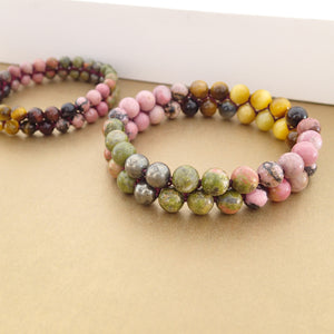 Coral Reef Gemstone bracelet by Pellara, shows colour combination of corals, made of Tiger Eye, Unakite, Rhodonite and Pyrite