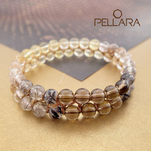 Load image into Gallery viewer, Chakra gemstone bracelet for the Crown Chakra, designed by Pellara. Made in Canada. Contains Citrine, Smoky Quartz and Golden Rutilated Quartz crystals