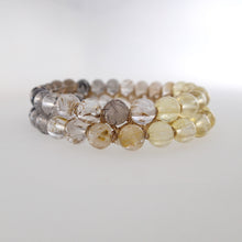 Load image into Gallery viewer, Chakra gemstone bracelet for the Crown Chakra, designed by Pellara. Made in Canada. Contains Citrine, Smoky Quartz and Golden Rutilated Quartz crystals.