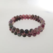 Load image into Gallery viewer, Chakra gemstone bracelet for The Heart Chakra, designed by Pellara. Made in Canada. Contains Rhodonite and Tourmaline crystals. 