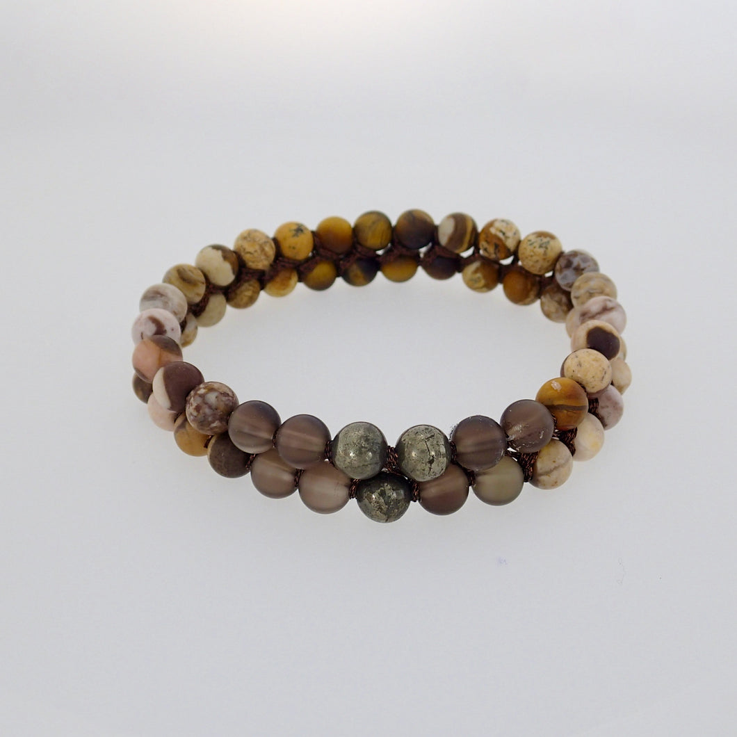 Gemstone bracelet by Pellara, Oasis, made of Pyrite, Smoky Quartz, Jasper & Tiger eye. Leo, Virgo, Scorpio, Sagittarius, Capricorn & Gemini zodiacs.