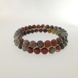 Chakra gemstone bracelet for The Sacral Chakra, designed by Pellara. Made in Canada. Contains BloodStone and Mookaite jasper crystals.