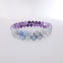 Load image into Gallery viewer, Chakra gemstone bracelet for The Throat Chakra, designed by Pellara. Made in Canada. Contains Amethyst, Aquamarine &amp; Beryl crystals. 