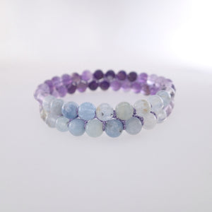 Chakra gemstone bracelet for The Throat Chakra, designed by Pellara. Made in Canada. Contains Amethyst, Aquamarine & Beryl crystals. 