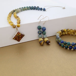 Gemstone necklace, earrings and bracelet jewellery set by Pellara, made of azurite malachite, Tiger’s eye, amber & Indian Jade 