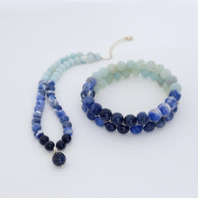 Load image into Gallery viewer,  Blue Jay, Gemstone bracelet by Pellara, made of Amazonite, Sodalite, Blue Tiger eye. Aries, Scorpio, Gemini, Pisces &amp; Leo zodiacs. 6