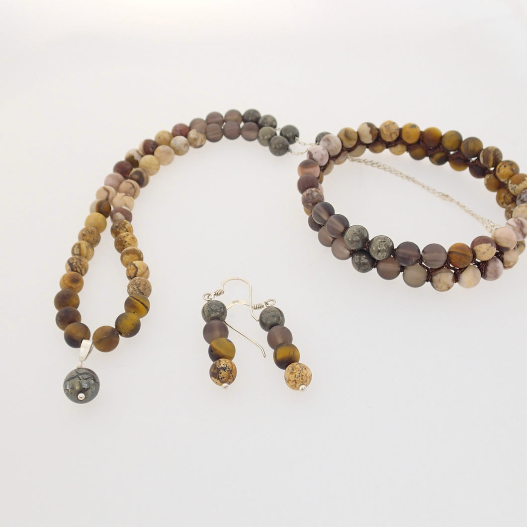 Gemstone jewellery set by Pellara, Oasis, made of Pyrite, Smoky Quartz, Jasper & Tiger eye. Leo, Virgo, Scorpio, Sagittarius, Capricorn & Gemini zodiacs. Aromatherapy