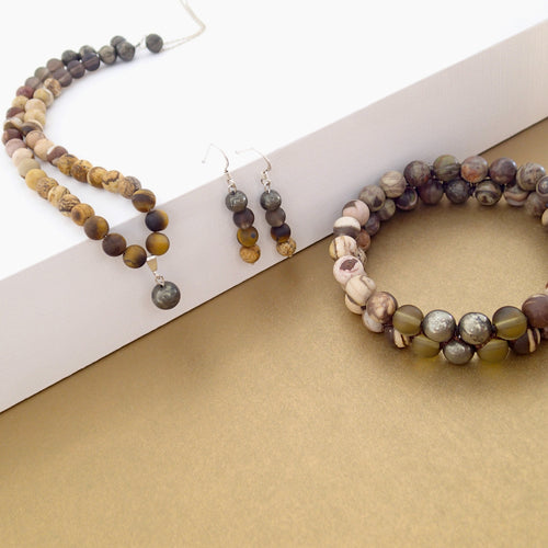 Gemstone jewellery set by Pellara, Oasis, made of Pyrite, Smoky Quartz, Jasper & Tiger eye. Leo, Virgo, Scorpio, Sagittarius, Capricorn & Gemini zodiacs. Aromatherapy