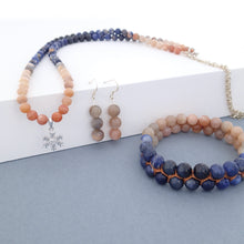 Load image into Gallery viewer, Gemstone jewellery set, Twilight by Pellara. Made of Silver, Sunstone, Moonstone, Blue Tiger Eye and Sodalite, Snowflake pendant