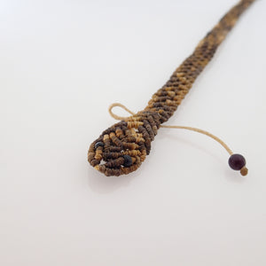 Cute baby snakes in modern macrame bracelet or choker, by Pellara, designed and made in Canada. Adjustable. Gift for nature lovers. baby rattle snake, dark brown