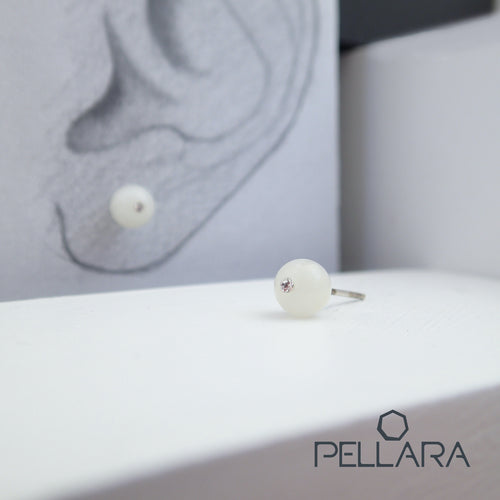 Sterling silver natural gemstone stud earrings contains a sparkling piece of Cubic Zirconia. Very light and hypo-allergenic, 6mm or 8mm beads. Moonstone