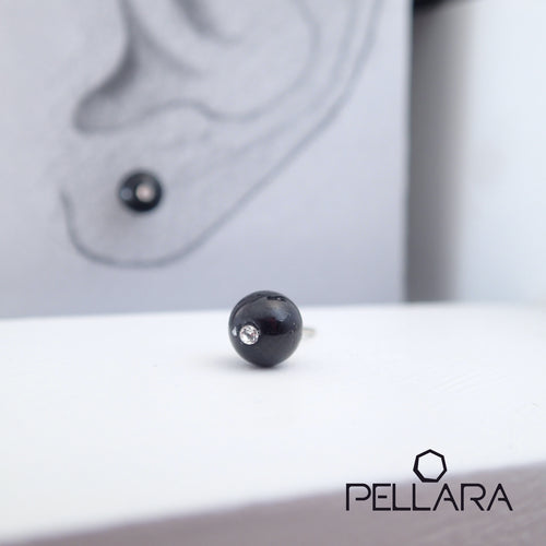Sterling silver natural gemstone stud earrings contains a sparkling piece of Cubic Zirconia. Very light and hypo-allergenic, 6mm or 8mm beads. Onyx